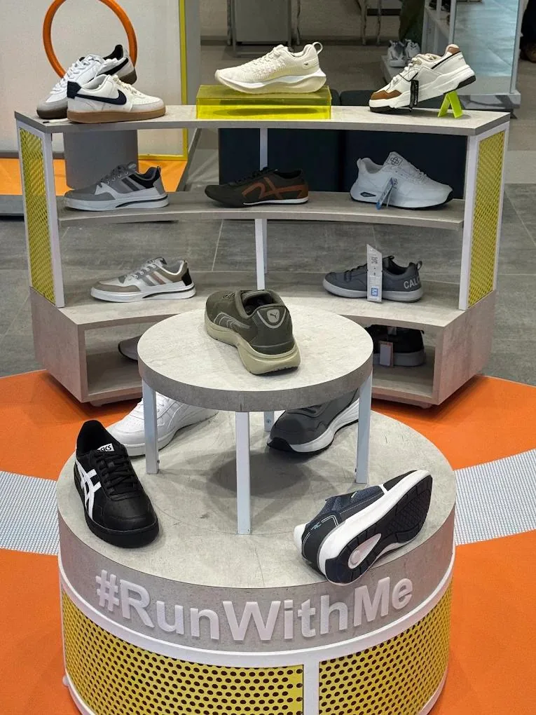 Custom footwear display fixture shown in company profile