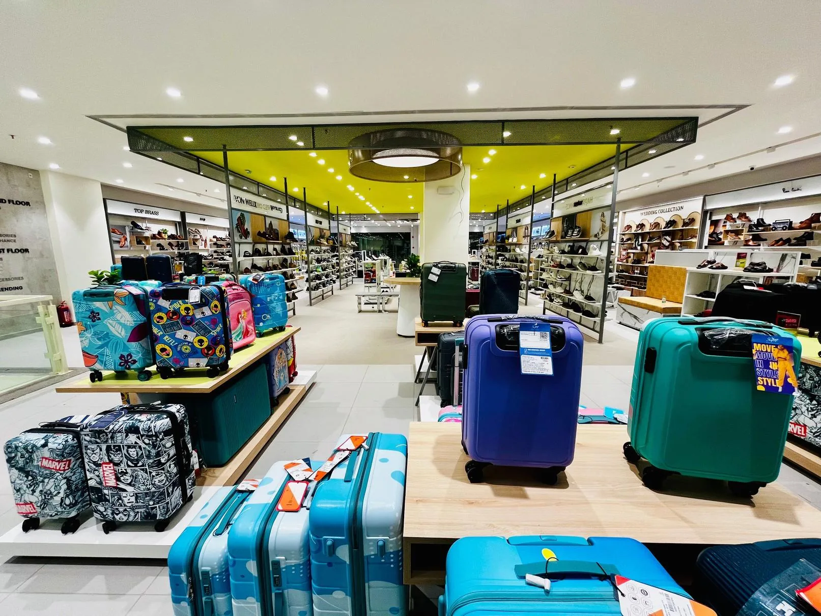 Luggage and footwear retail interior shown in Magnate profile