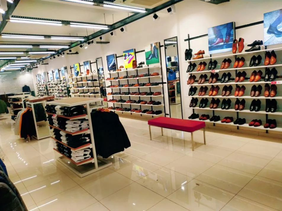 Retail footwear wall installation shown in Magnate company profile
